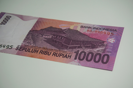Indonesia banknotes Rupiah, Indonesia currency, background money Indonesia, ten thousand rupiah, 10 thousand rupiah on white background