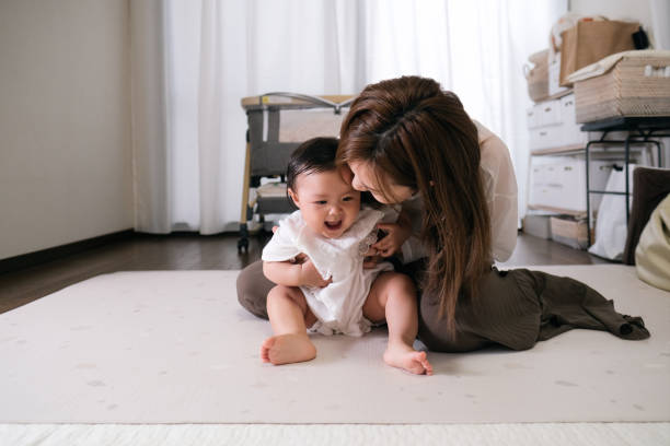 istock Mother talking to baby 1424791635