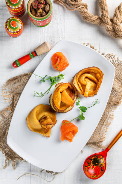 istock Deep fried pork wonton put on black dish, pinach hummus and shrimps on slate board 1424793241