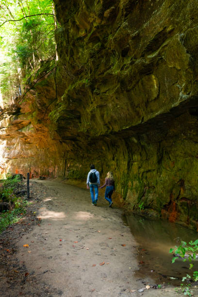 istock College couple hiking Turkey Run State Park, IN 1424793552