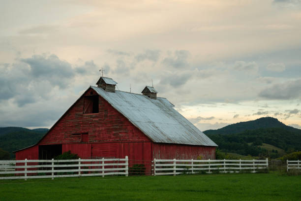 Barn in fresh snow after a winter storm, calm and tranquil, a farm in rural Pennsylvania, PA, USA.