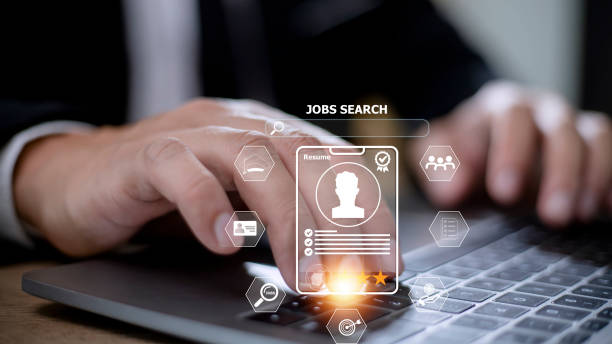 istock Human using a computer laptop for searching for job and fill out personal data on job website to file a resume and apply application to jobs on the internet. work search online concept. 1424793822