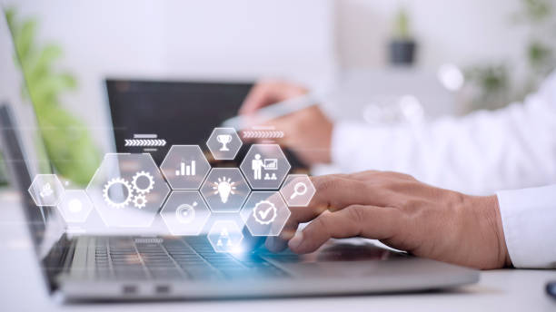 istock Business process management concept. Businessman touch on virtual innovation Operations management gears icons, High quality control , Problem solving, workflow, monitoring and innovation. 1424794088