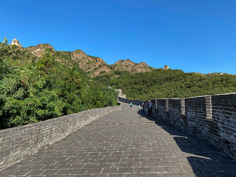 Qinhuangdao, Hebei, China-September 18, 2022: People normally call ten thousand kilometers Great Wall of China and it starts from Shanghaiguan, an important pass from center of China to the Northeast part of China. It is on the seaside of the Bohai Sea. The Jiaoshan (Jiao Mountain) is the first mountain the Great Wall crosses over from the starting point. Here is the beautiful scenery of Jiaoshan  Great Wall .