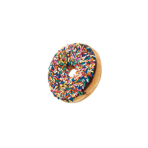 istock Chocolate donut with sprinkles isolated on white background with clipping path 1424803762