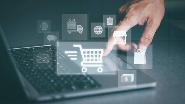 istock Ecommerce concept and online selling website Cyberspace-based retail businesses use it to communicate between store owners and customers, virtual shopping carts on a laptop. 1424805142