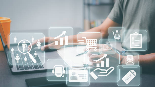 istock Entrepreneurs work on laptops that feature customer analytics icons, marketing plans and marketing strategies, customer behavior and purchase analysis, and customer research in various aspects. 1424806753