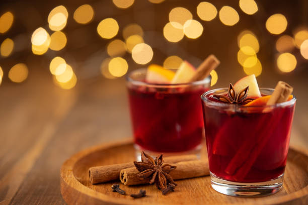 Mulled wine with spices on wooden background. Copy space Mulled wine with spices on wooden background. Close up mulled wine stock pictures, royalty-free photos & images