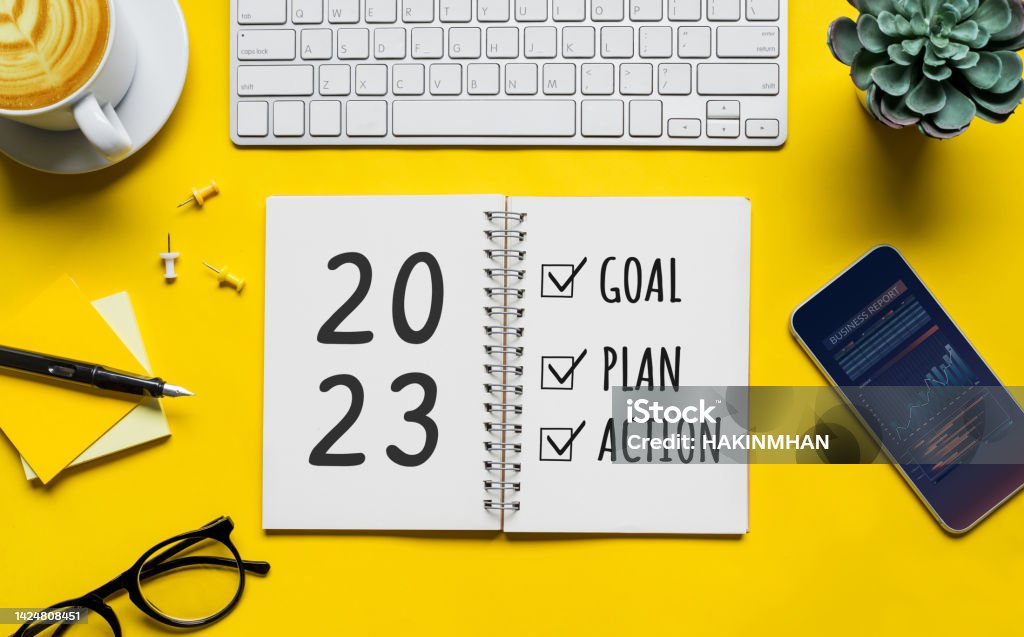 2023 new year goal,plan,action concepts with text on notepad and office accessories.Business management,Inspiration to success 2023 new year goal,plan,action concepts with text on notepad and office accessories.Business management,Inspiration to success ideas 2023 Stock Photo