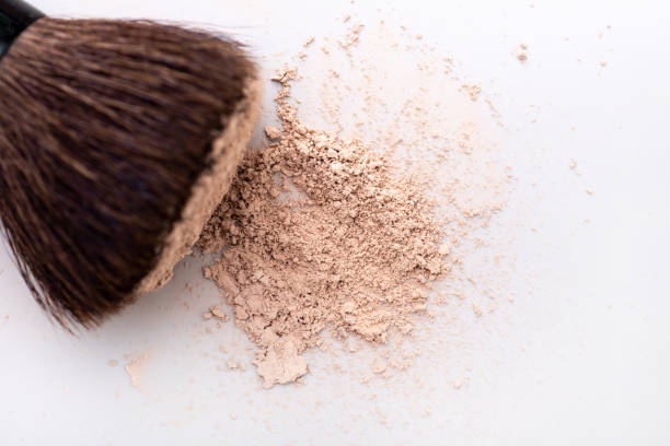 istock scattered skin colored powder on a light background 1424810811