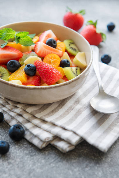 istock Healthy fresh fruit salad in a bowl 1424833118