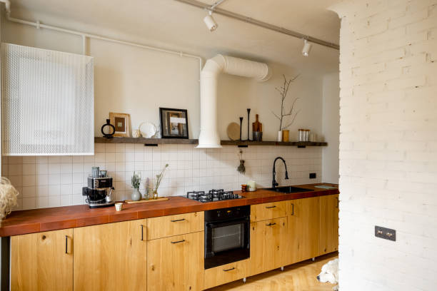 istock Stylish kitchen interior of modern apartment 1424834292