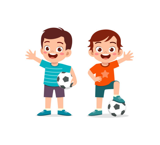 kleines kind spielt fußball zusammen mit freund - jugendfußball stock-grafiken, -clipart, -cartoons und -symbole