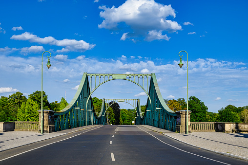 The Glienicker Bridge over the Havel between Berlin and Potsdam with a blue sky