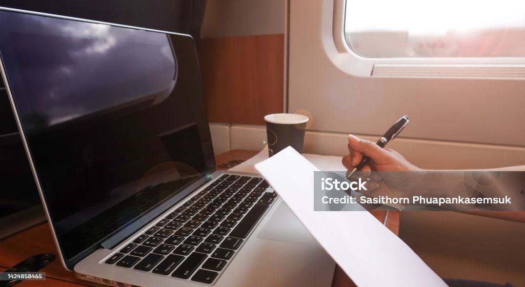 Nomad digital woman hand  as she is a freelance working  a vacation with laptop in the train at the morning Adult Stock Photo