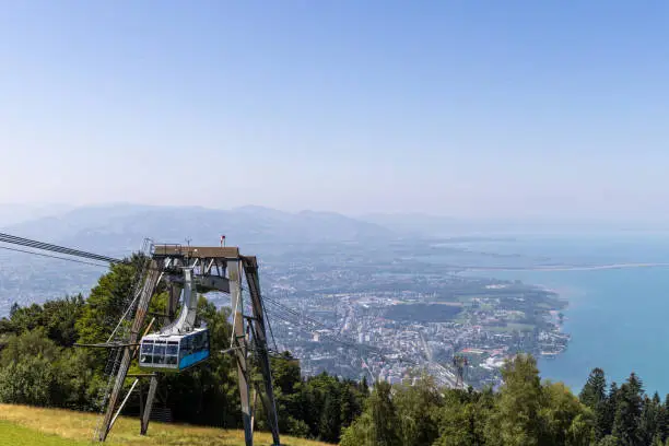 Sideview of Pfänderbahn Cable Car, Bregenz, with Bregenz in the background during summer
