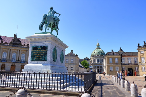 May 23 2022 - Copenhagen, Denmark: the Frederik's Church (Danish: Frederiks Kirke) and Sculpture of Frederik V on Horseback in Amalienborg Square