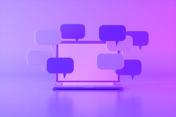 istock Online chat speech bubble on laptop neon background 1424869787