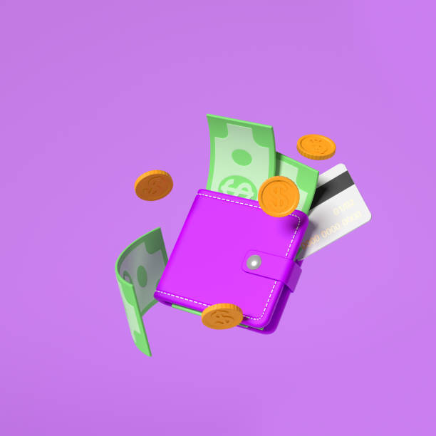 istock Wallet with banknotes and coins on violet background 1424871382