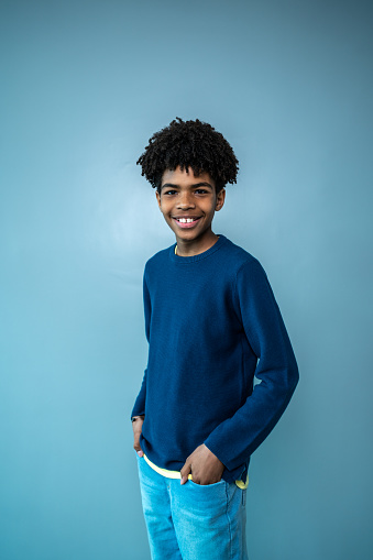 Portrait of a boy on a blue background