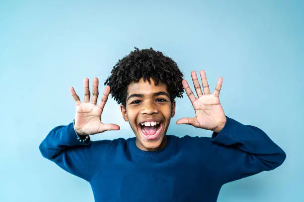 Portrait of a boy on a blue background