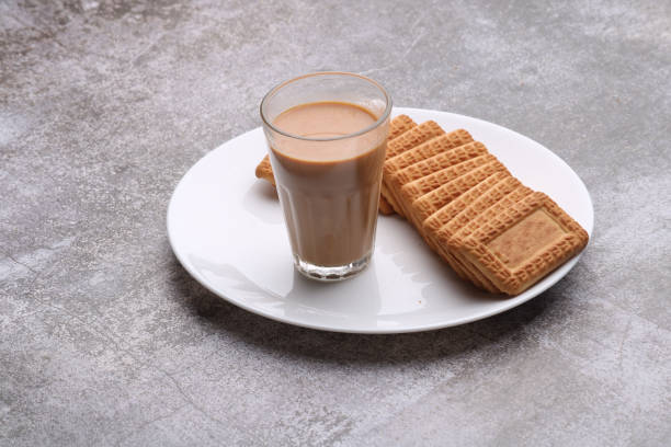 istock Cutting Chai, Traditional Desi Roadside tea of india with biscuits. 1424875585
