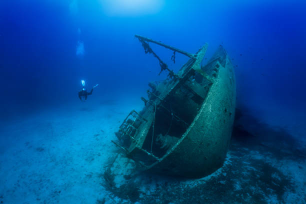 istock A unrecognizable scuba diver explores a sunken shipwreck 1424876468
