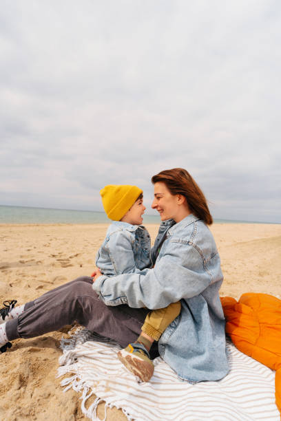 istock Spending an autumn day at the beach 1424880768