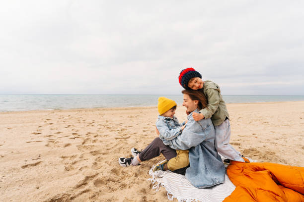 istock Hug for our mommy 1424880775