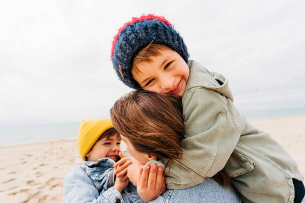 istock Hug for our mommy 1424880789