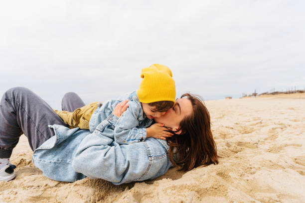 istock Spending an autumn day at the beach 1424880815
