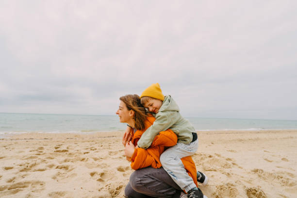 istock Mother and son moments at the beach 1424880873