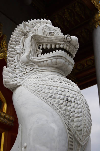 istock Singha stone statue in a temple in Bangkok, Thailand 1424883330