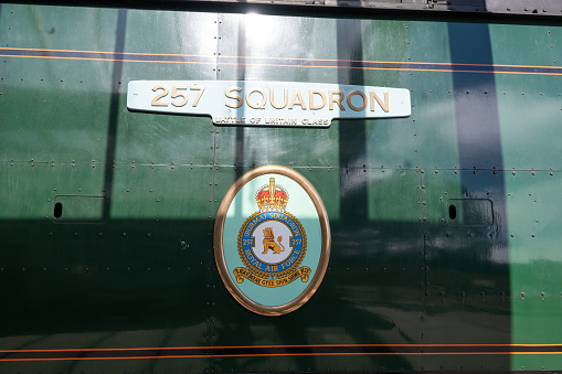 Swanage.Dorset.United Kingdom.August 24th 2022.The Burma Squadron Royal Air Force logo is on the side of the  Royal Wessex steam train at Swanage train station