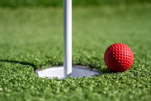 miniature golf course - hole with ball in detail