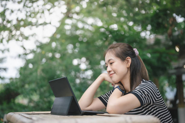 istock Asian student subscription online Private class university with her professor 1424896424