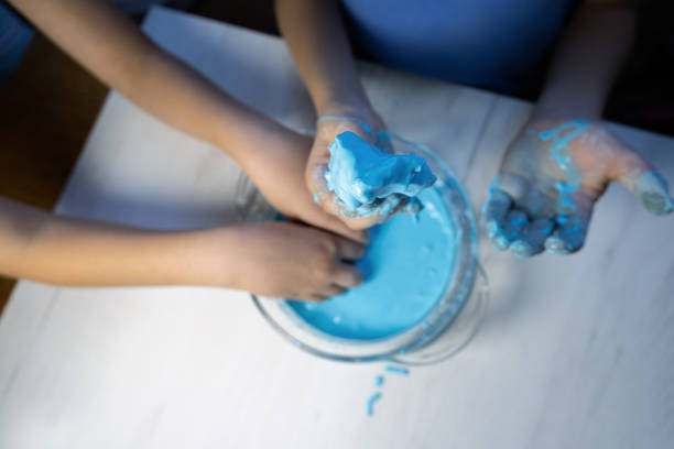 istock Non newtonian fluid, kids chemistry experiment. 1424897083