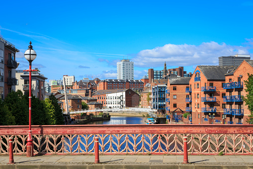 The river Aire and Leeds city centre. The photo shows Crown Point Bridge and the Centenary footbridge, plus the area known as Brewery Wharf.