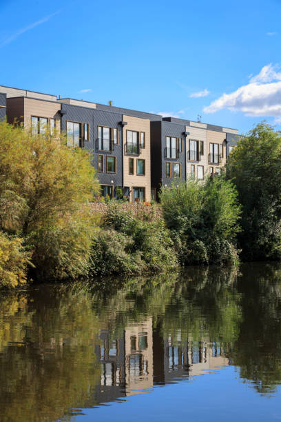 New build, modern eco housing by the River Aire in Leeds stock photo
