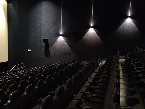 empty modern cinema hall with lights