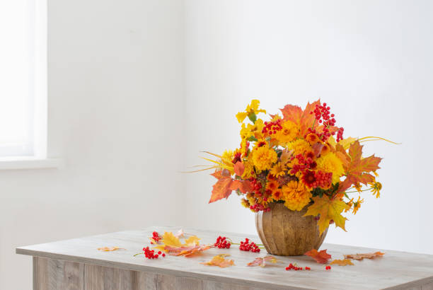 istock autumnal bouquet in ceramic vase on white background 1424907220