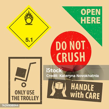 istock Set of fragile sticker do not crush and case icon packaging symbols sign, open here and handle with case rubber stamp on cardboard background. Use on package. 1424908044