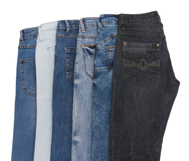 istock jeans denim set isolated on white background with copy space. Top view and mock up clothes. Male female pants collage isolated 1424908231