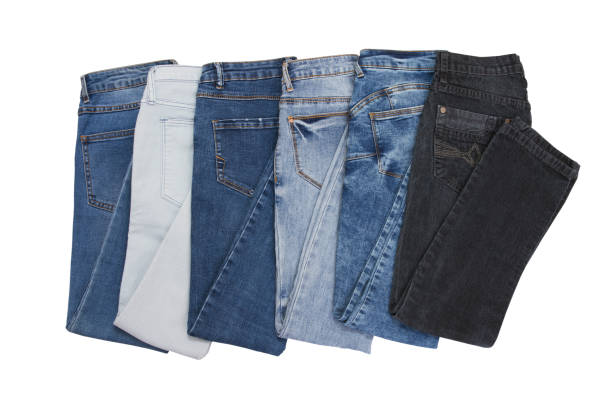 istock jeans denim set isolated on white background with copy space. Top view and mock up clothes. Male female pants collage isolated 1424908237