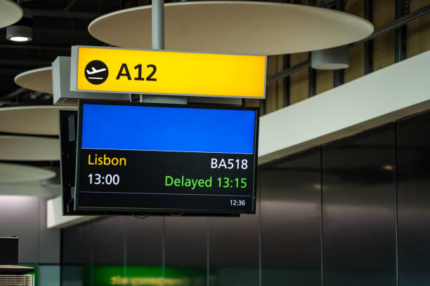 istock Airport flight/gate information board for flight to Lisbon 1424917922
