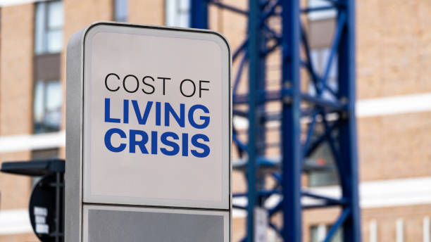Cost of Living Crisis in a city setting under construction Cost of Living Crisis in a city setting under construction cost of living stock pictures, royalty-free photos & images