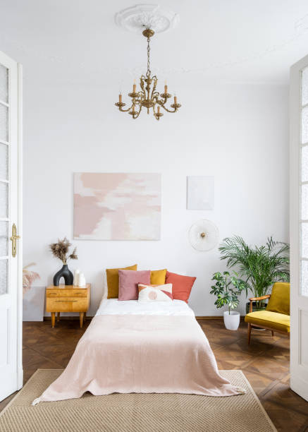 istock Vintage bedroom in apartment with retro interior design 1424918863