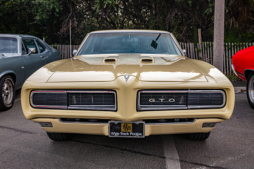 Tybee Island, GA - October 3, 2020: Front view of a 1968 Pontiac GTO Hardtop Coupe at a local car show.