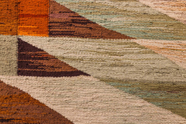 istock Part of old vintage carpet texture with abstract ornament 1424922302