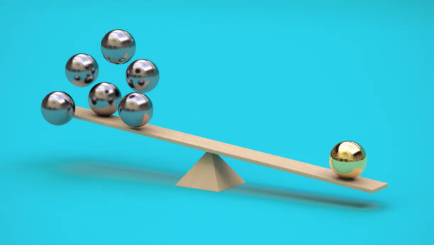 istock One gilded ball outweighs several metal balls on a swing. 3D rendering. Minimalism. Abstraction. Balance concept. Not like everyone else 1424922865